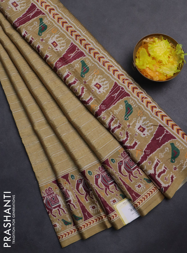 Semi tussar saree sandal with zari stripes pattern and patola printed border