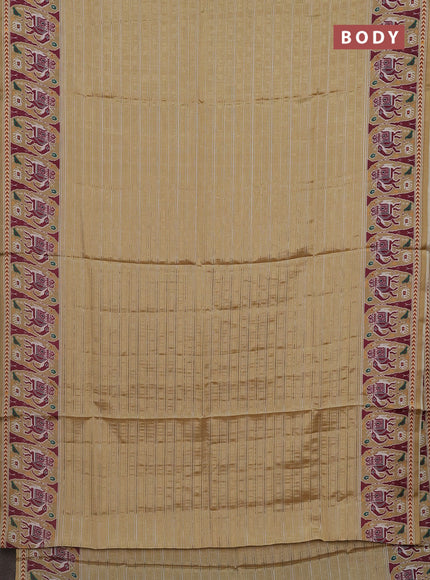 Semi tussar saree sandal with zari stripes pattern and patola printed border