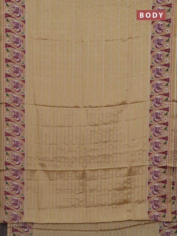 Semi tussar saree sandal with zari stripes pattern and patola printed border