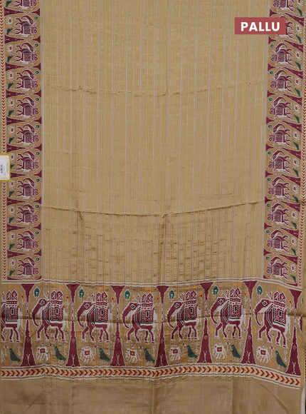 Semi tussar saree sandal with zari stripes pattern and patola printed border