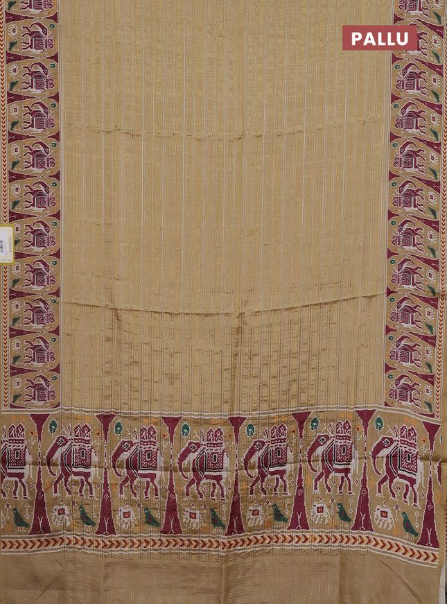 Semi tussar saree sandal with zari stripes pattern and patola printed border