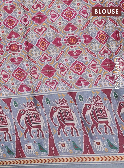 Semi tussar saree pastel grey with zari stripes pattern and patola printed border