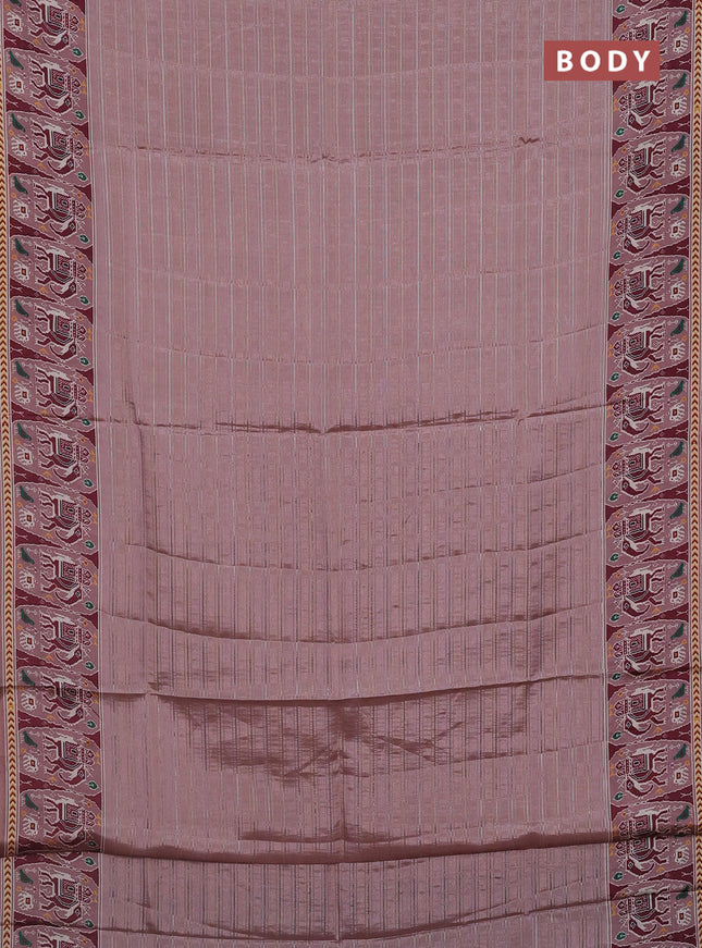 Semi tussar saree pastel peach with zari stripes pattern and patola printed border