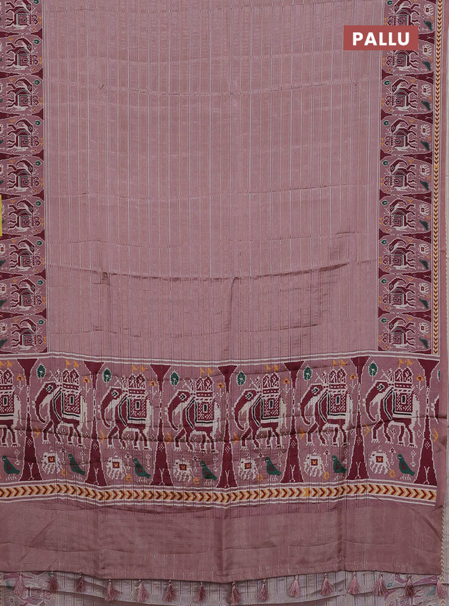 Semi tussar saree pastel peach with zari stripes pattern and patola printed border