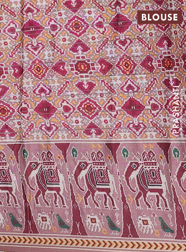 Semi tussar saree pastel peach with zari stripes pattern and patola printed border