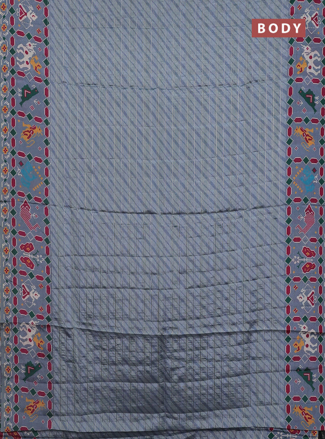 Semi tussar saree pastel grey with leheriya prints and patola printed border