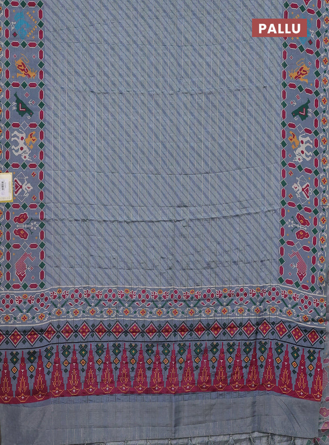 Semi tussar saree pastel grey with leheriya prints and patola printed border