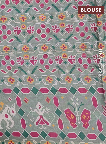 Semi tussar saree pastel green with leheriya prints and patola printed border