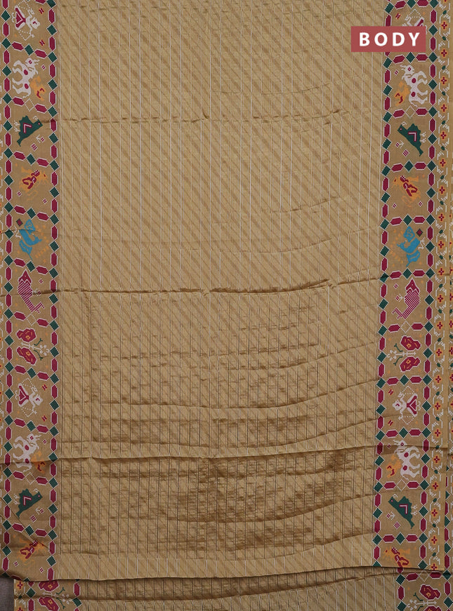 Semi tussar saree sandal with leheriya prints and patola printed border