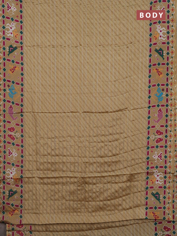 Semi tussar saree sandal with leheriya prints and patola printed border
