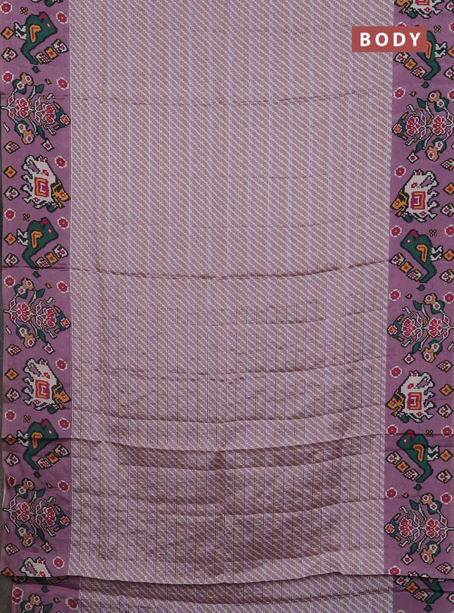 Semi tussar saree pastel pink with leheriya prints and patola printed border