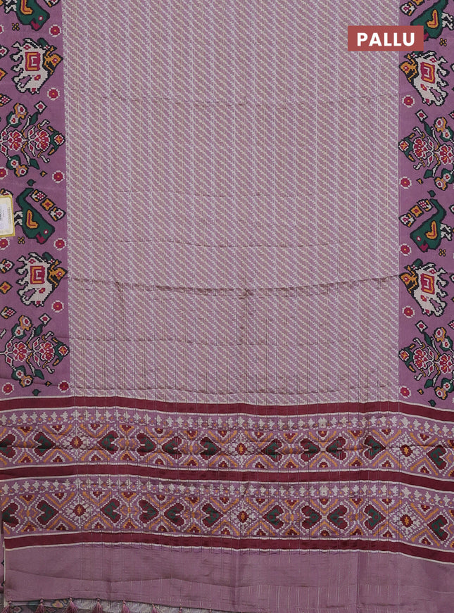 Semi tussar saree pastel pink with leheriya prints and patola printed border