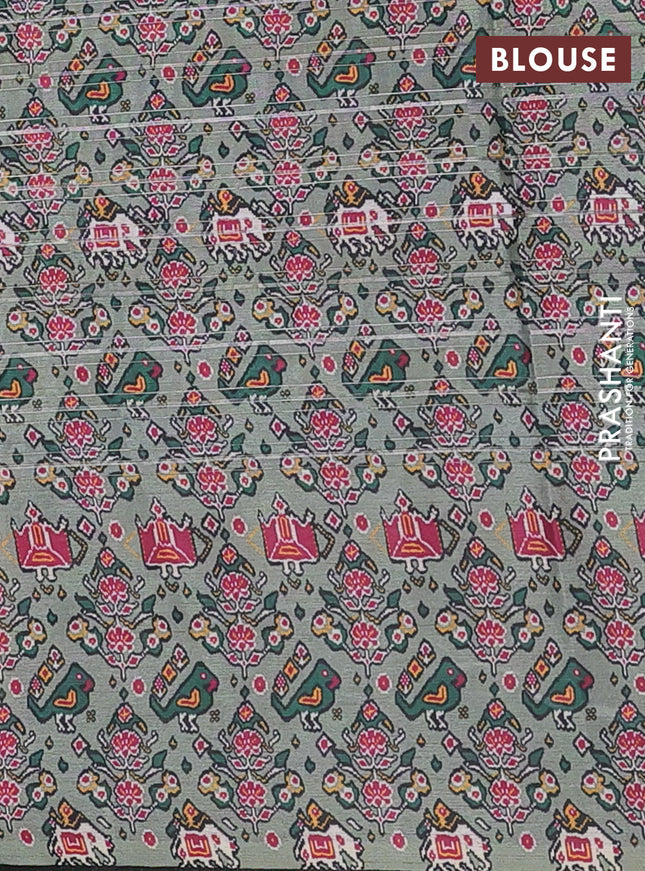 Semi tussar saree pastel green with leheriya prints and patola printed border