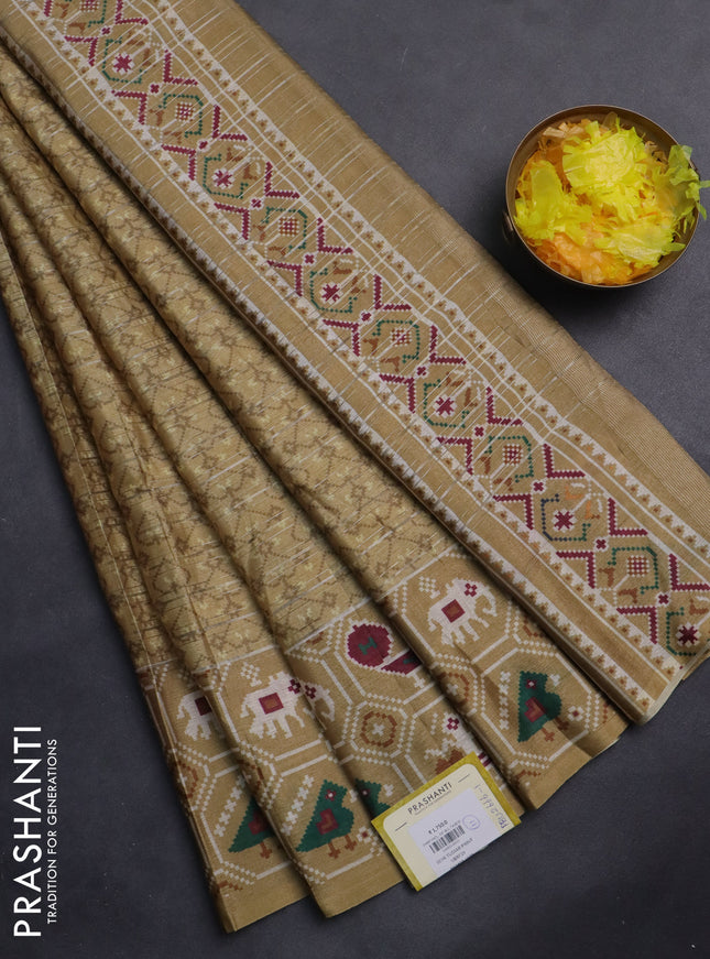 Semi tussar saree sandal with zari stripes pattern and patola printed border