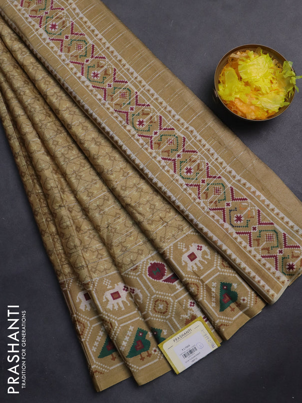 Semi tussar saree sandal with zari stripes pattern and patola printed border