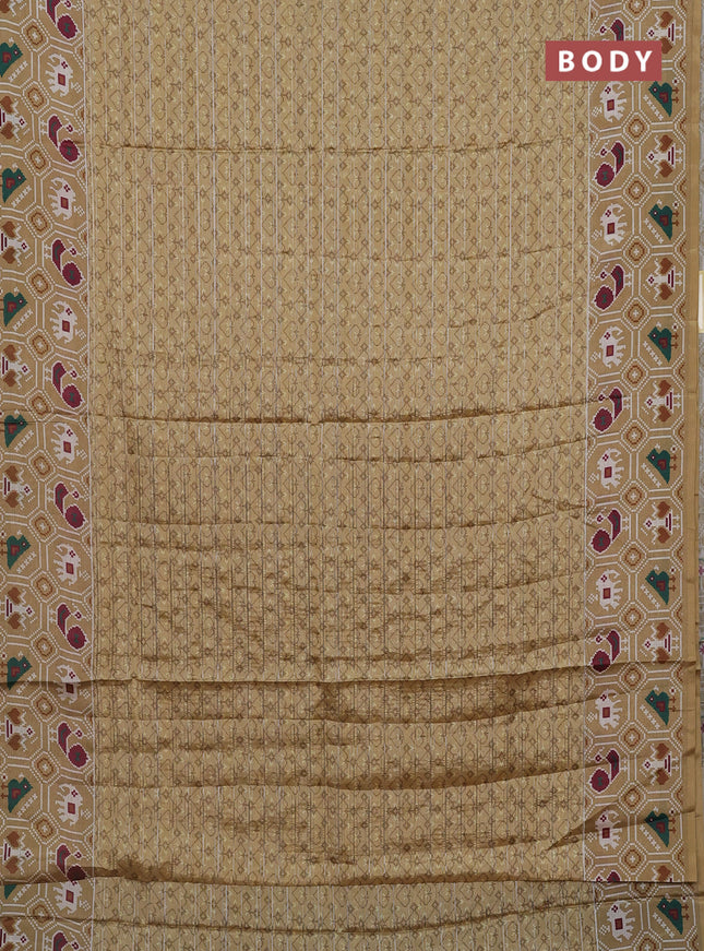 Semi tussar saree sandal with zari stripes pattern and patola printed border