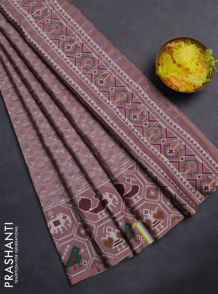 Semi tussar saree pastel pink with zari stripes pattern and patola printed border