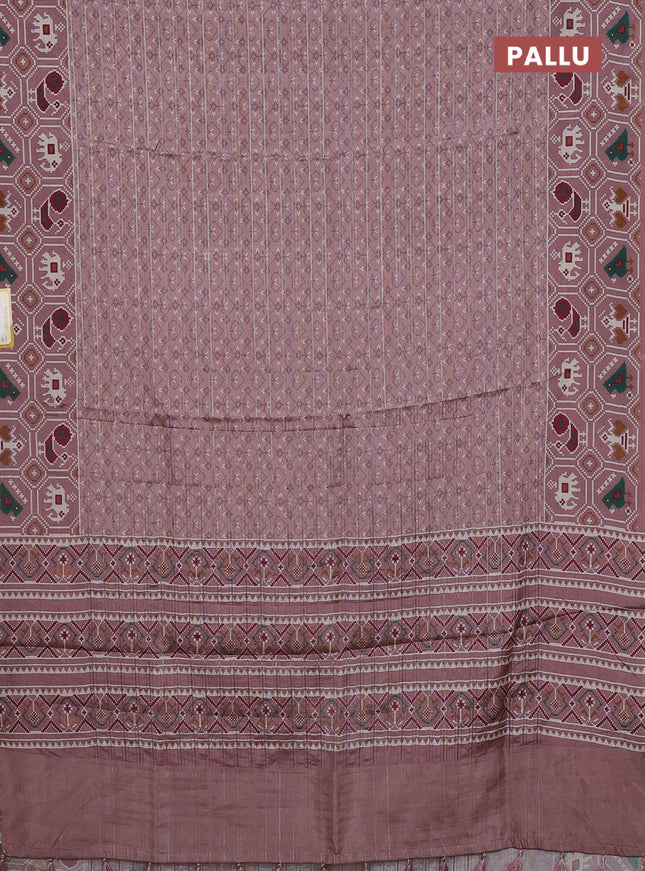 Semi tussar saree pastel pink with zari stripes pattern and patola printed border