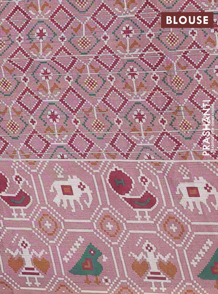 Semi tussar saree pastel pink with zari stripes pattern and patola printed border