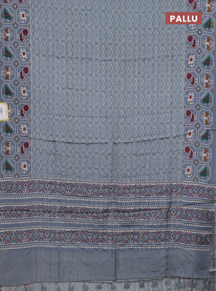 Semi tussar saree grey shade with zari stripes pattern and patola printed border