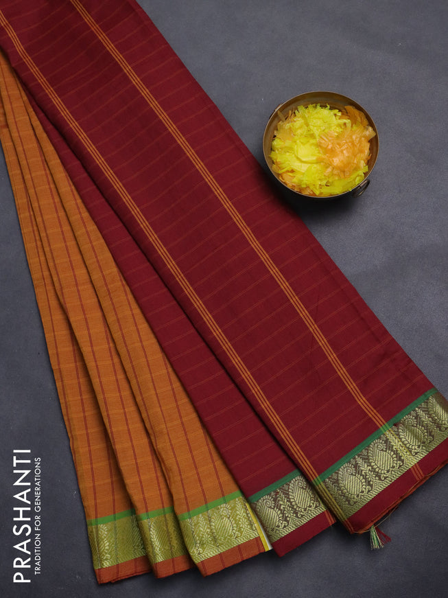 10 Yards poly cotton saree dark mustard and maroon with allover checked pattern and zari woven border