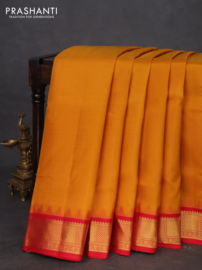 10 yards silk saree mustard yellow and red with palin body and temple design zari woven border