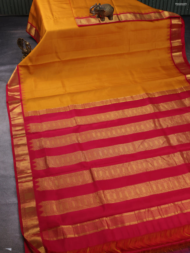10 yards silk saree mustard yellow and red with palin body and temple design zari woven border
