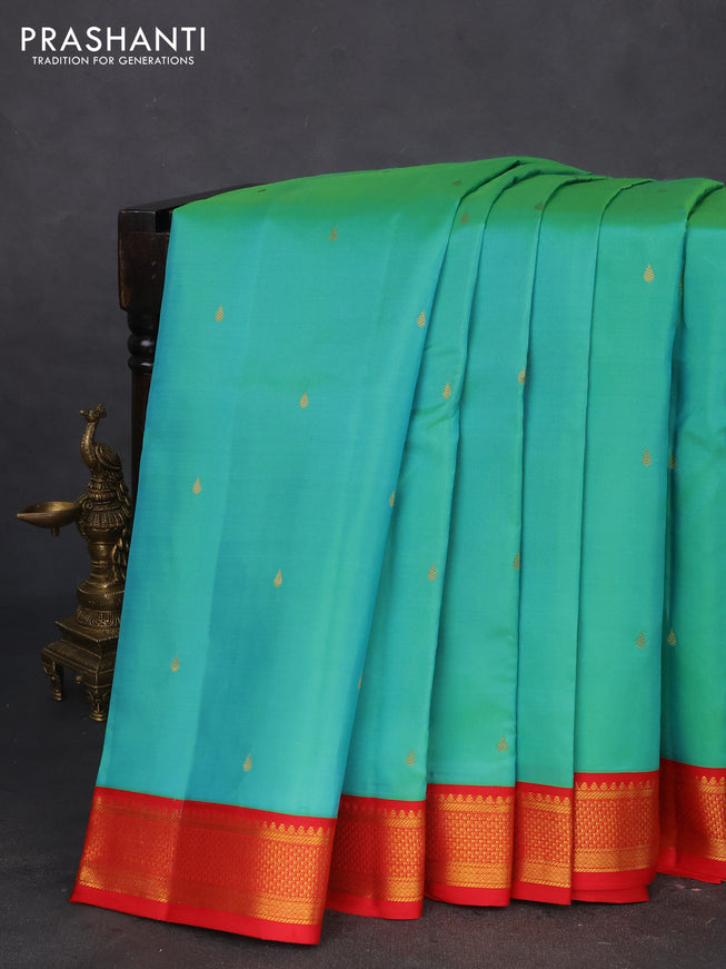 10 yards silk saree dual shade of teal green and red with zari woevn buttas and zari woven border