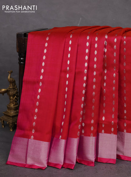 Pure uppada silk saree dual shade of pinkish orange with allover silver zari woven buttas and zari woven border
