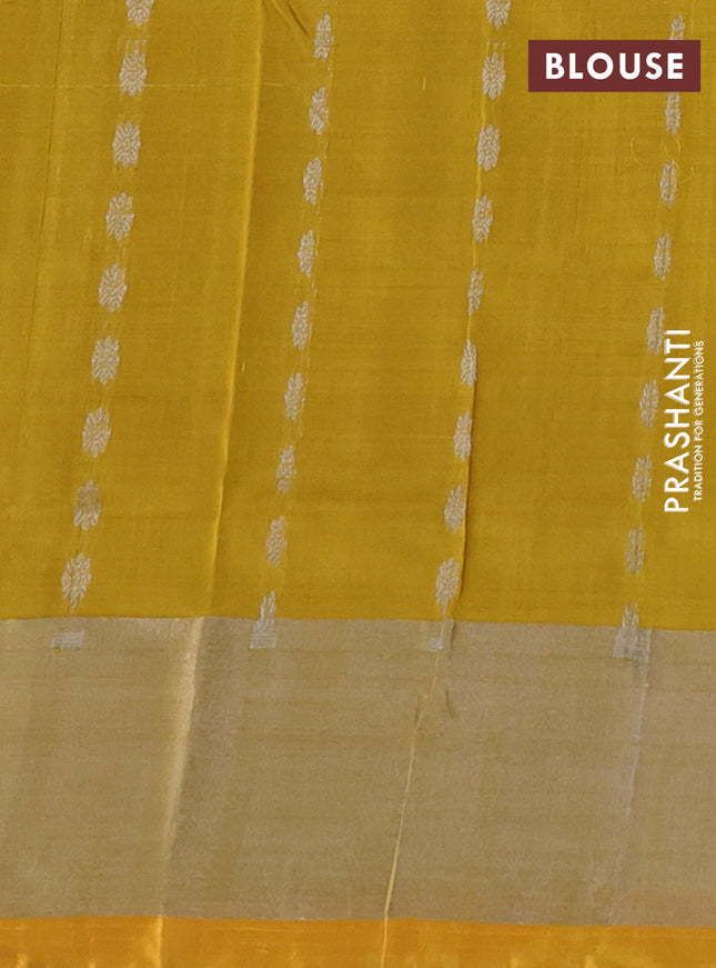 Pure uppada silk saree mustard shade and yellow with allover silver zari woven buttas and zari woven border