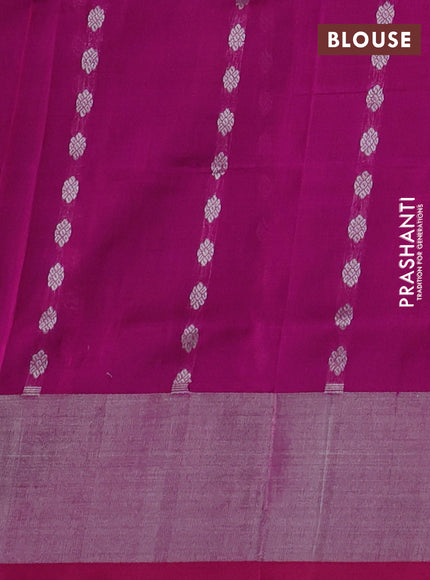 Pure uppada silk saree dual shade of teal blue and pink with allover silver zari woven buttas and zari woven border