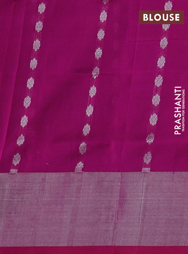 Pure uppada silk saree dual shade of teal blue and pink with allover silver zari woven buttas and zari woven border