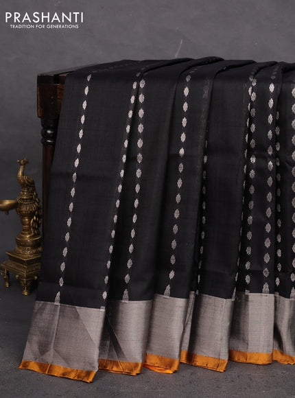 Pure uppada silk saree black and yellow with allover silver zari woven buttas and zari woven border