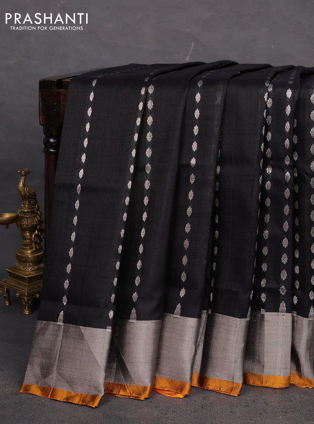 Pure uppada silk saree black and yellow with allover silver zari woven buttas and zari woven border
