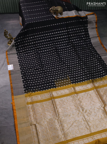 Pure uppada silk saree black and yellow with allover silver zari woven buttas and zari woven border
