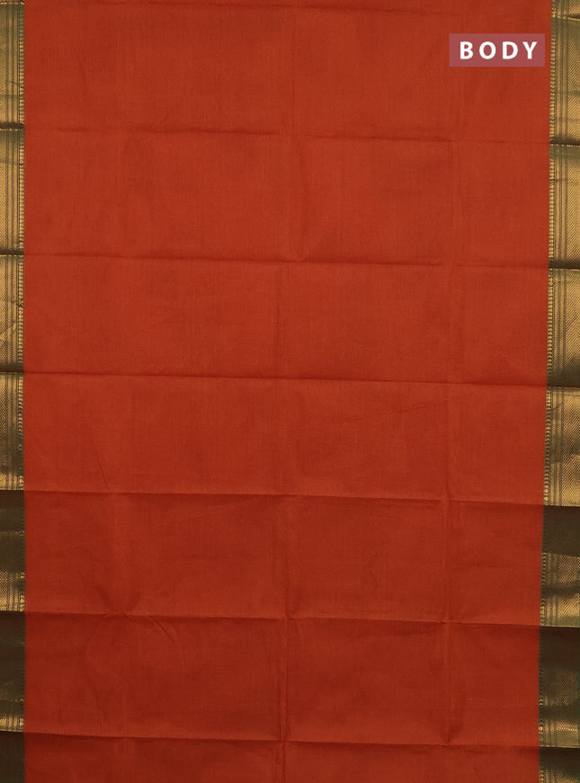 Chettinad cotton saree rust shade and green with allover small checked pattern and zari woven border