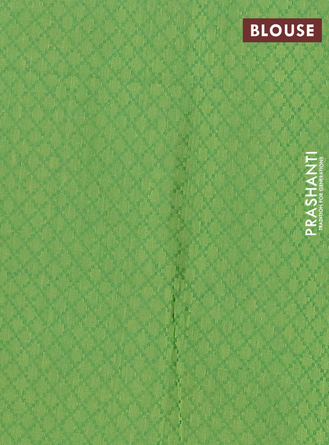 Chettinad cotton saree rust shade and green with allover small checked pattern and zari woven border