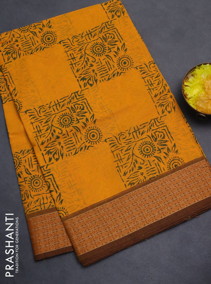 Chettinad cotton saree mango yellow and brown with allover block prints and thread woven border