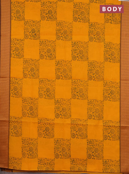 Chettinad cotton saree mango yellow and brown with allover block prints and thread woven border