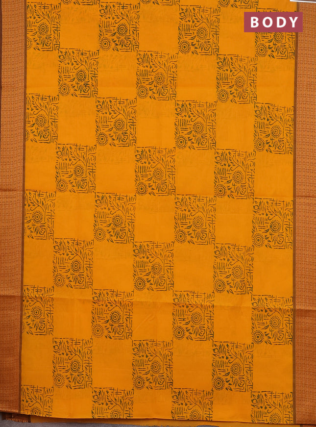 Chettinad cotton saree mango yellow and brown with allover block prints and thread woven border