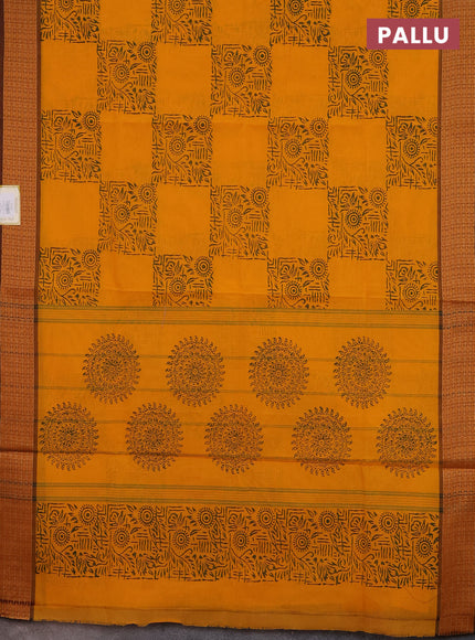 Chettinad cotton saree mango yellow and brown with allover block prints and thread woven border