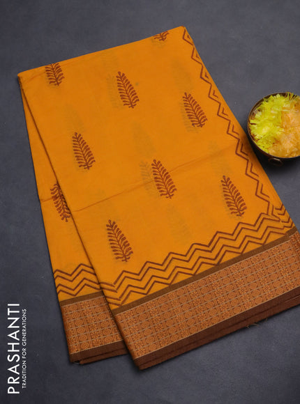 Chettinad cotton saree mango yellow and brown with allover block prints and thread woven border