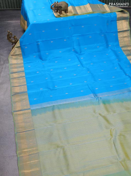 Kanchipuram silk saree cs blue and dual shade of green with zari woven buttas and zari woven border