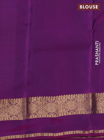 Kanchipuram silk saree dual shade of teal and purple with allover zari weaves and rettapet zari woven border