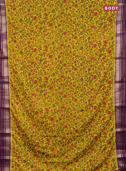 Semi mysore silk saree lime yellow and deep purple with allover kalamkari prints and zari owven border