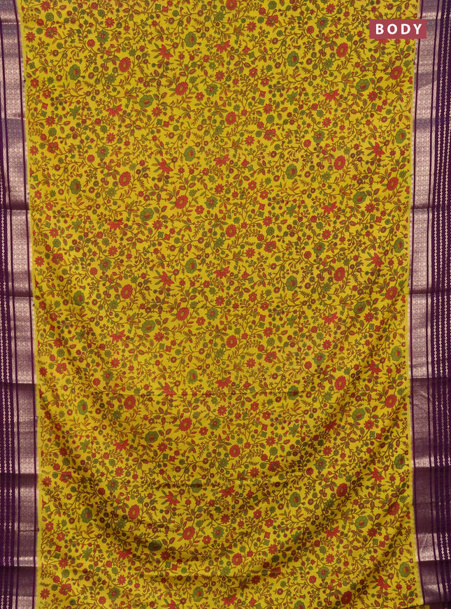 Semi mysore silk saree lime yellow and deep purple with allover kalamkari prints and zari owven border