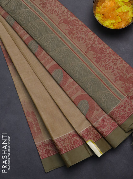 Nithyam cotton saree sandal and sap green shade with thread woven buttas and thread woven simple border