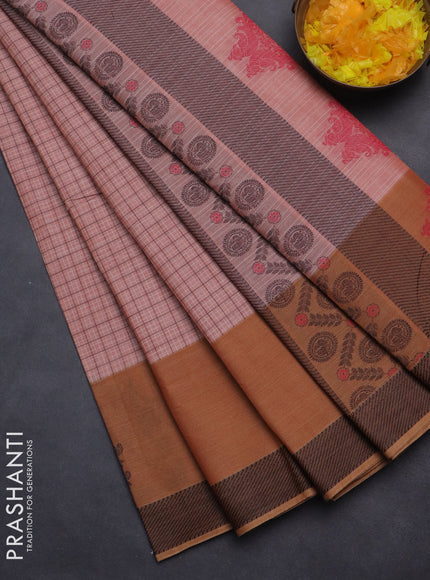 Nithyam cotton saree pastel peach and dark sandal with allover checked pattern and thread woven border