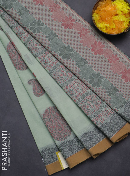 Nithyam cotton saree pastel green and dark mustard with allover checked pattern & zari buttas in borderless style