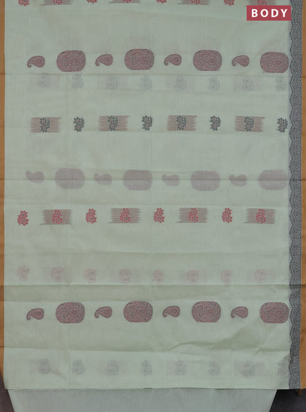 Nithyam cotton saree pastel green and dark mustard with allover checked pattern & zari buttas in borderless style